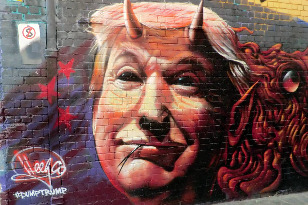 The Orange Demon Revealed In Grafitti.